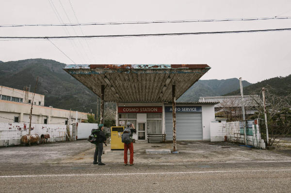 Photographing an abandoned gasoline stand