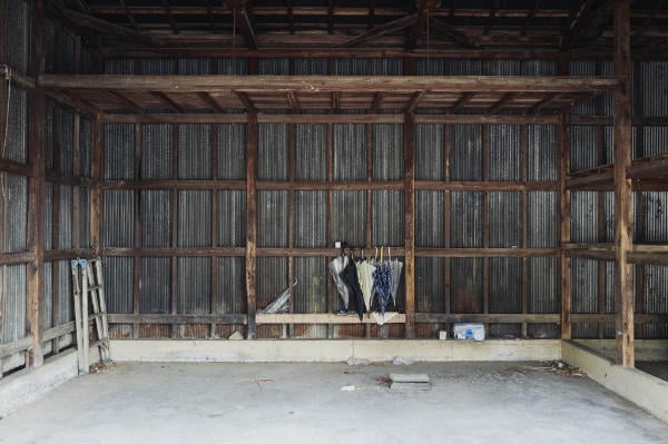 Umbrellas in a wooden garage